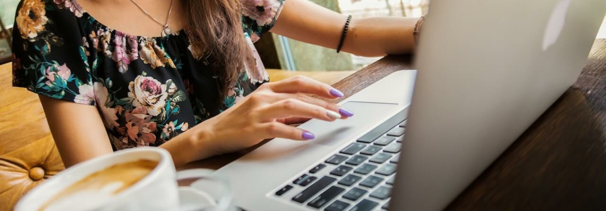 girl on laptop working on website maintenance