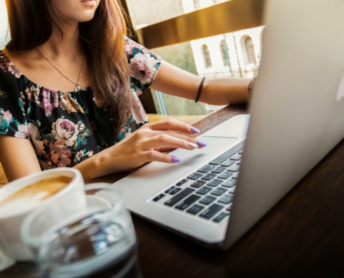 Best Practices For Website Maintenance 3 girl on laptop working on website maintenance
